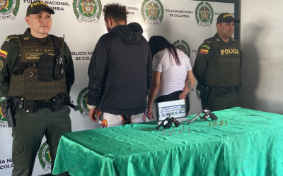 Vigilancia capturó a una pareja con dos armas en Girón